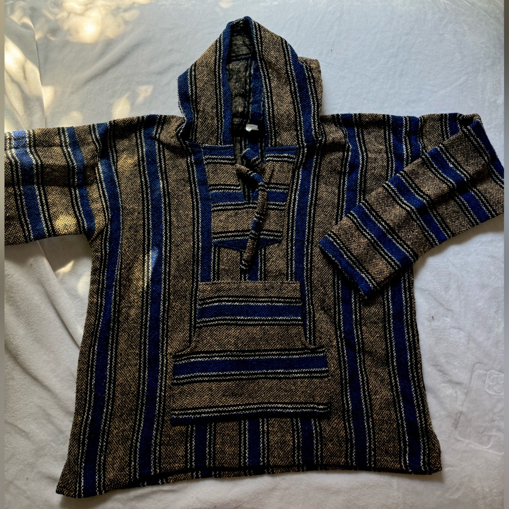 tan and blue baja jacket